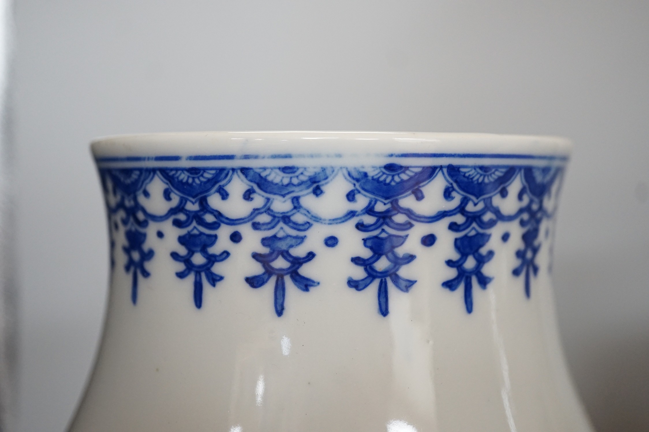 A pair of Japanese blue and white vases, 37cm high